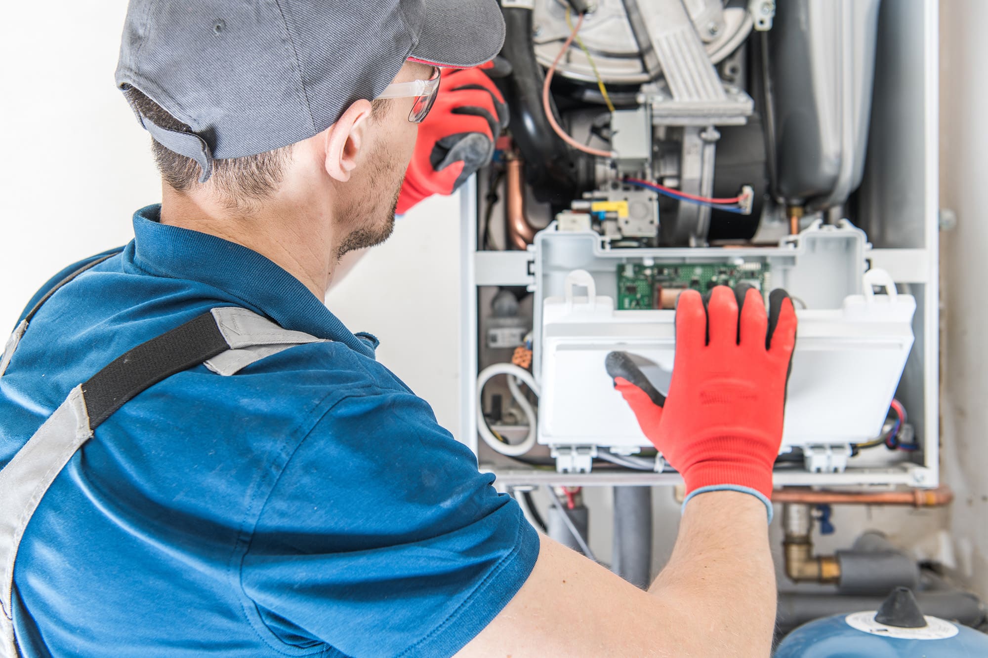 HVAC services being performed by ServicePlus Heating and Cooling