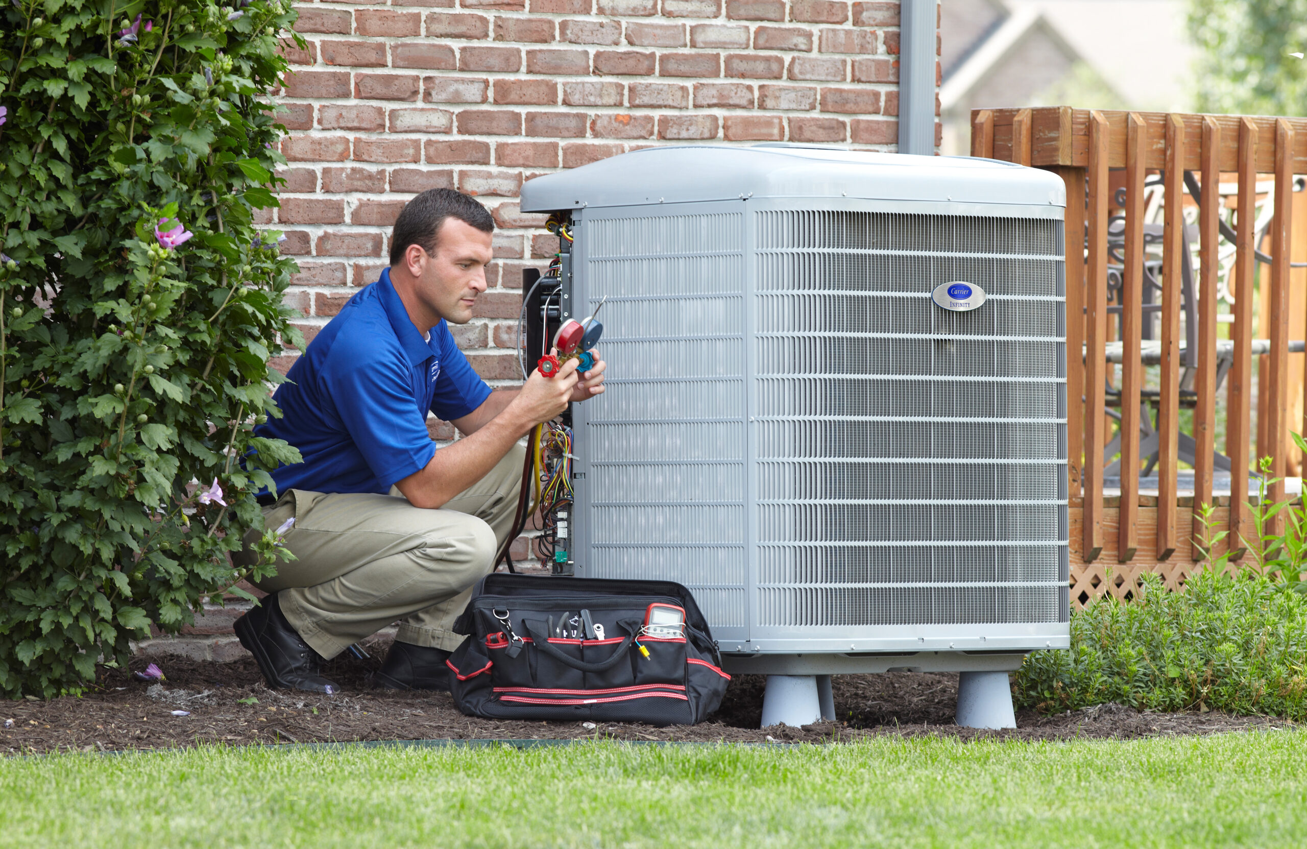 Technician making a repair on a heat pump. 