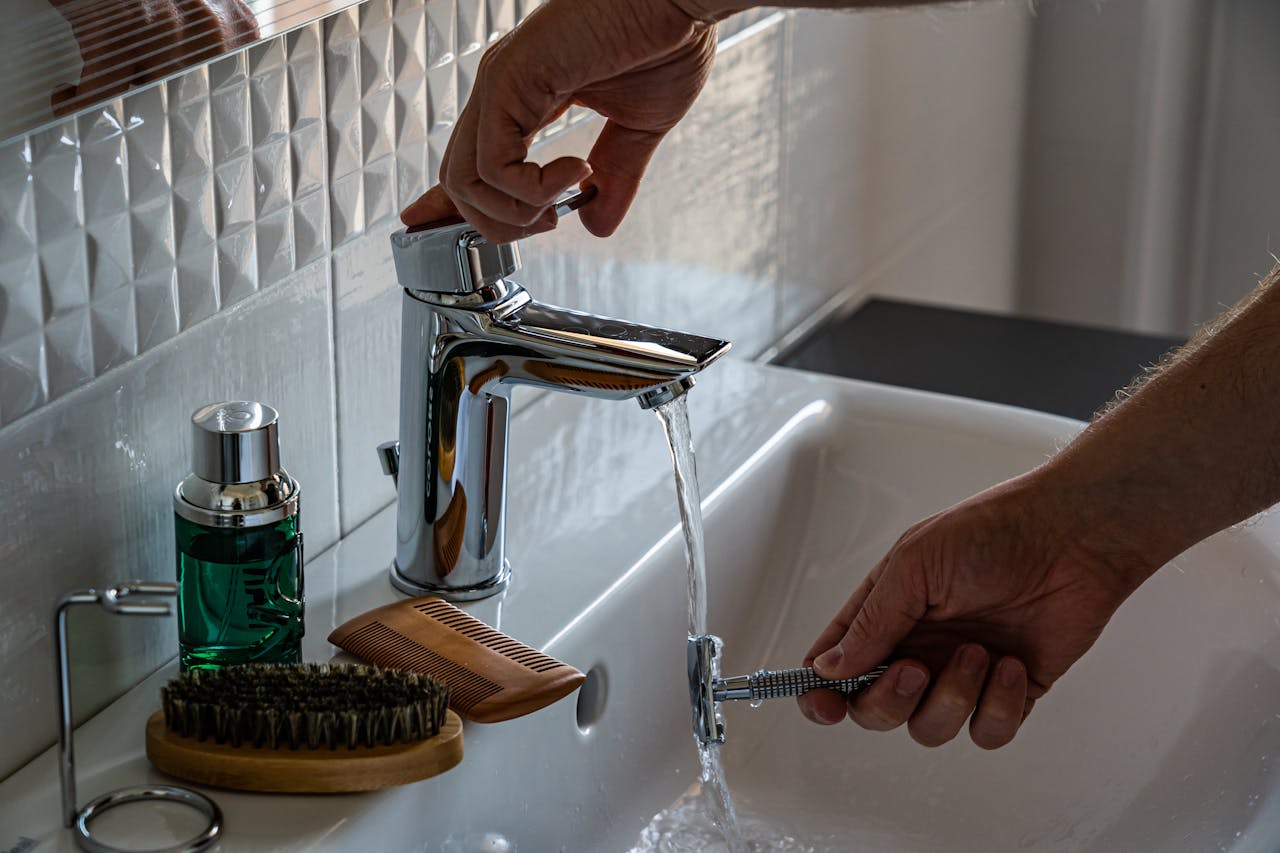 Hot water coming from the tap after a water heater maintenance the flushing all the sediment out of the heater.